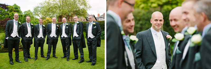 Groom with groomsmen in grounds of church
