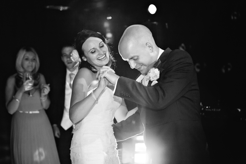 Bride and Groom dancing and laughing