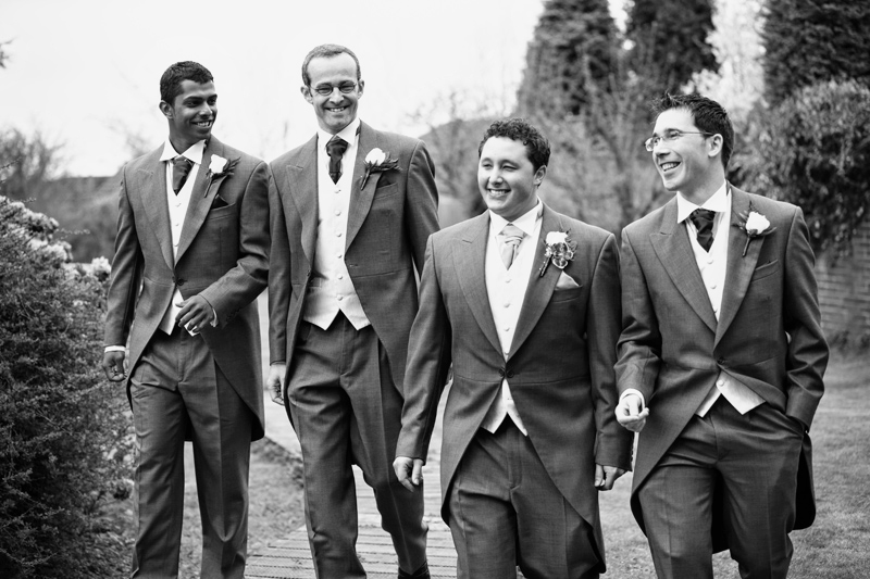 Groom and the groomsmen make their way to the ceremony