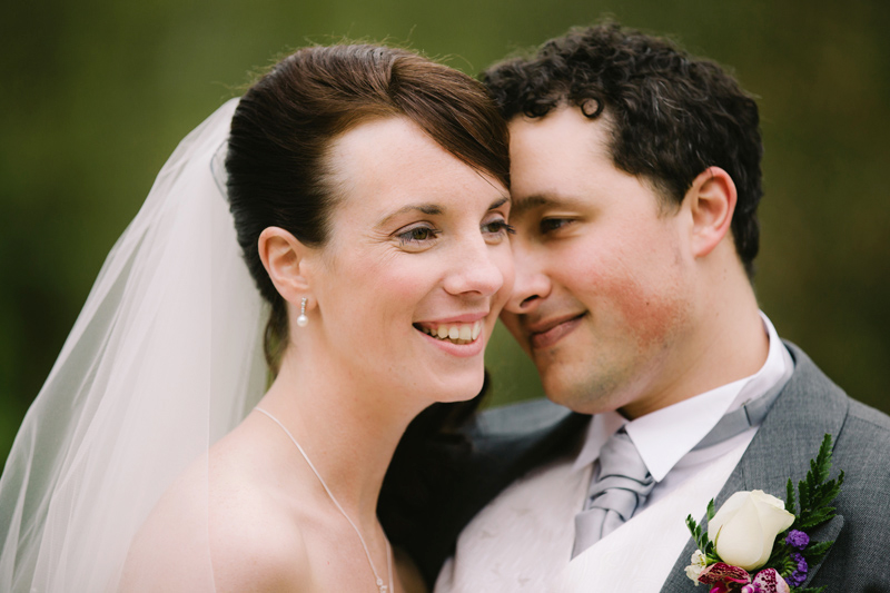 Bride and Groom snuggling together