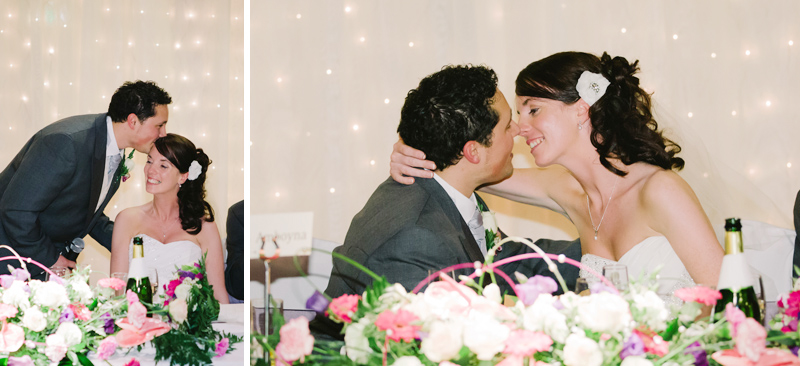 The Bride and Groom kiss during the speeches