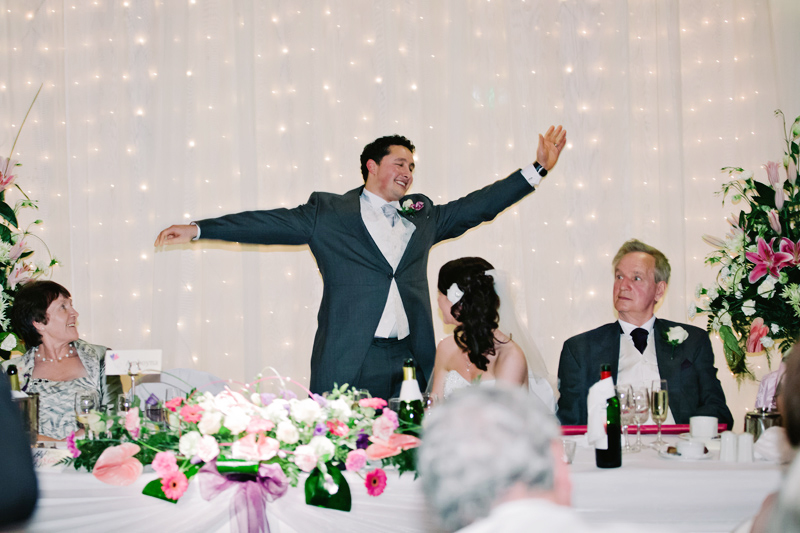 The Groom sings during his speech