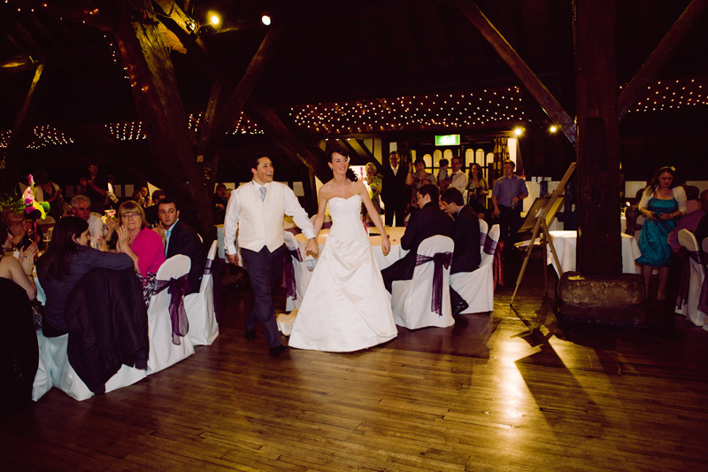 Bride and Groom walk onto the dance floor for their first dance